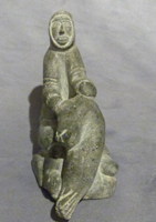 ALAKU Pingu - Chasseur avec phoque